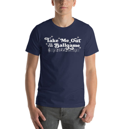 Image of man wearing navy t-shirt with design of "Take Me Out to the Ballgame" with coordinating musical notes in white located on centre chest. This design is exclusive to Tailgate Mercantile and available only online.