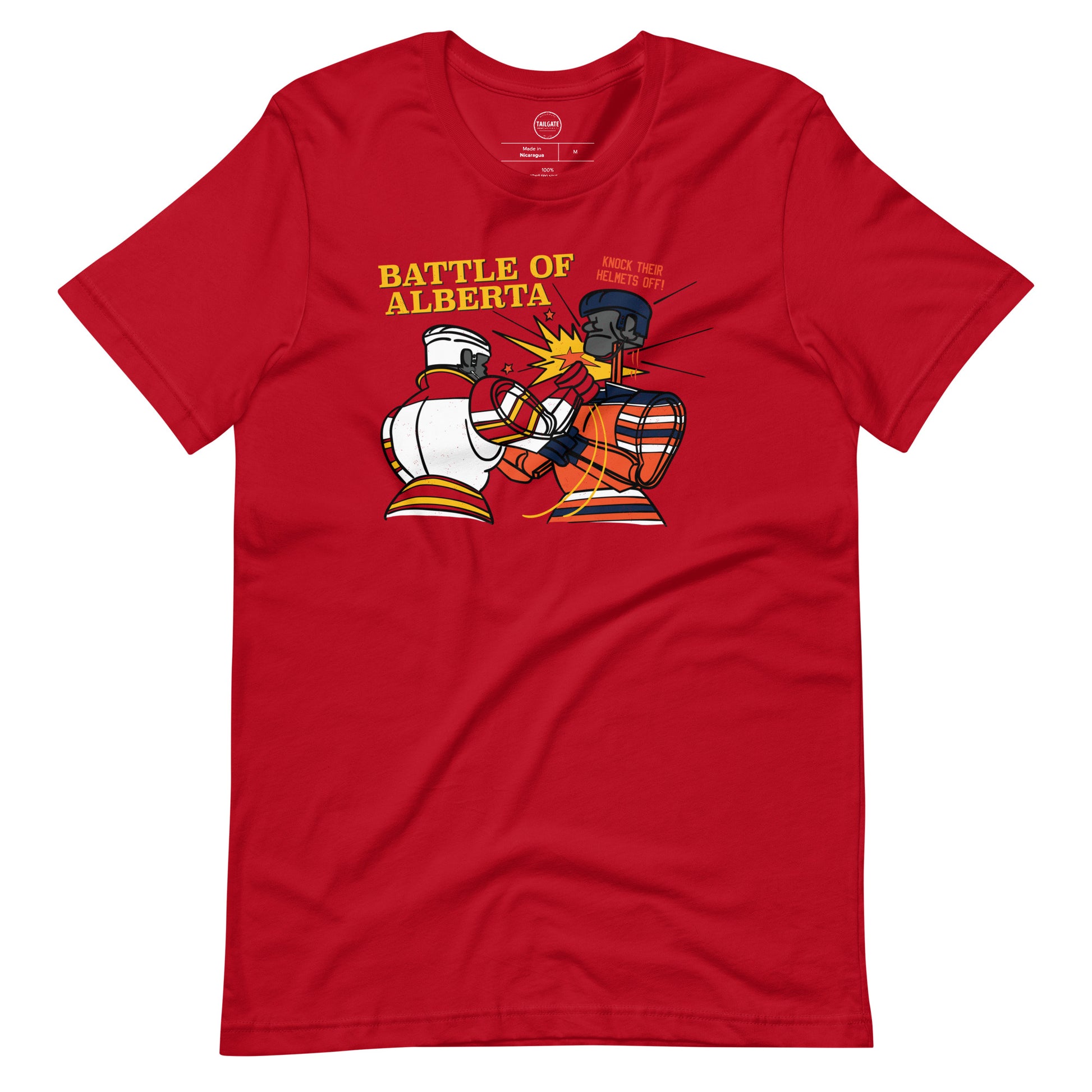 Image of red t-shirt with design of "Battle of Alberta" with rock'em, sock'em style hockey players fighting located on centre chest. Players in the design are completed in NHL Calgary Flames and Edmonton Oilers colours. This design is exclusive to Tailgate Mercantile and available only online.